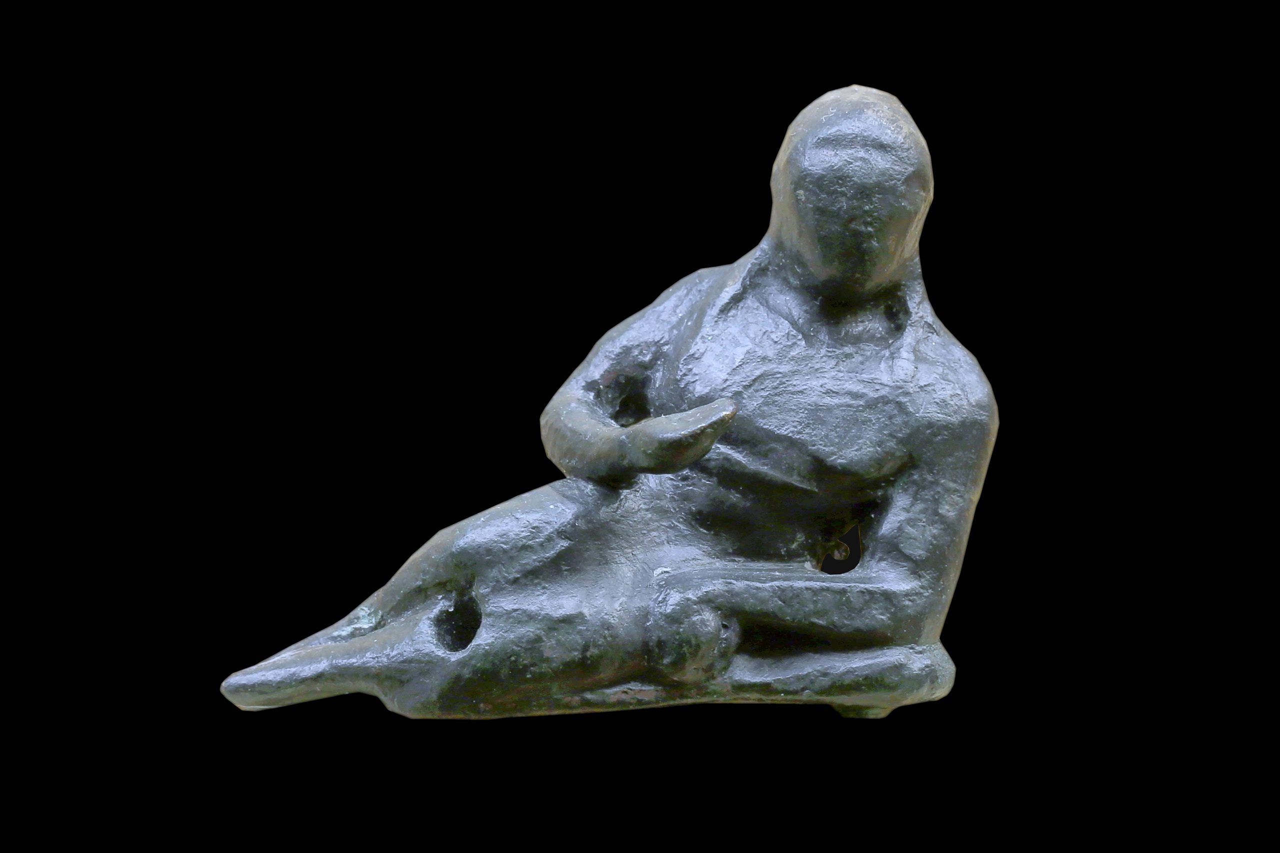 Estatuilla etrusca de El RasoLa Cerca, El Raso, CandeledaOrientalizante. Siglo VI/V a.C.Bronce / 4,2 x 5 x 1 cm[IM 992]. Sala V, vitrina 6